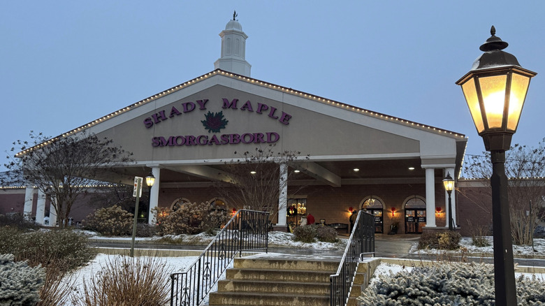 Exterior of Shady Maple Smorgasbord restaurant in the winter