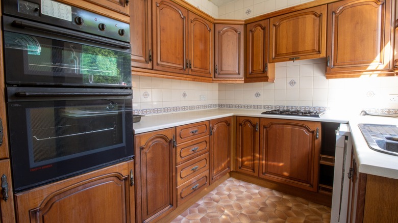 retros 1980s kitchen with black wall oven