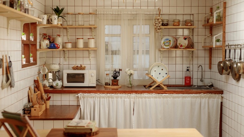 a microwave sits on a kitchen counter