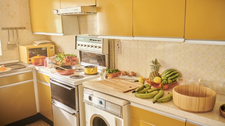 kitchen with yellow laminate cabinets