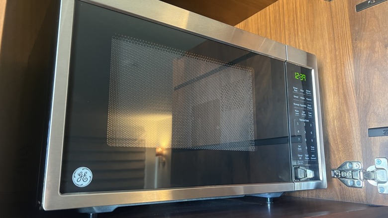 microwave in kitchen cabinet