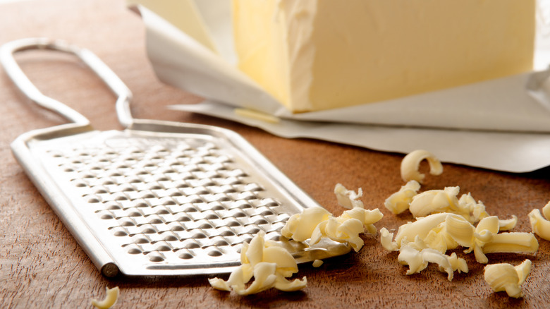 grated butter next to cheese grater
