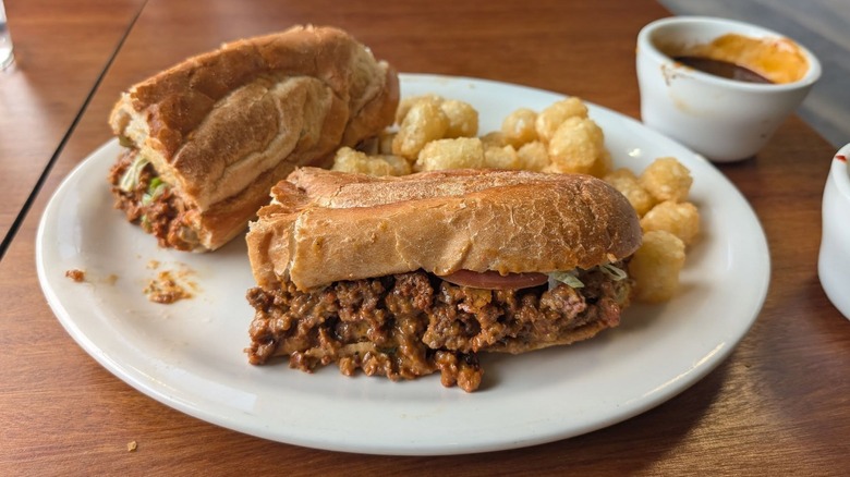 Chopped cheese sandwich on white plate