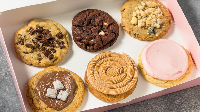 Six crumbl cookies in open box