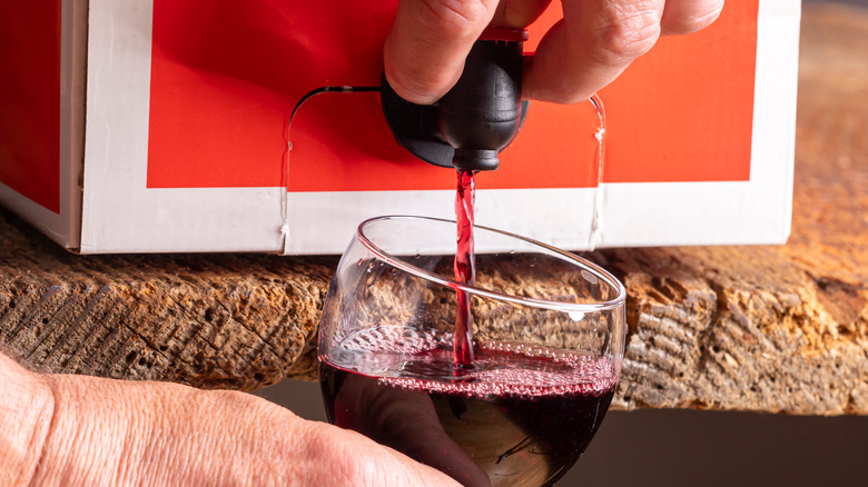 Pouring wine from box