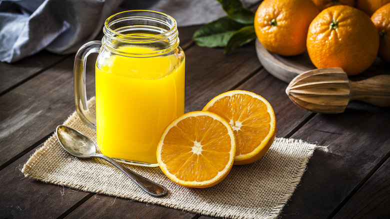 Open jar of orange juice