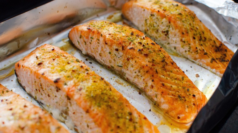 salmon on a pan in the oven