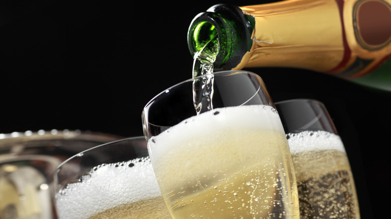 Pouring a glass of champagne