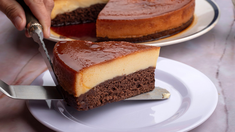 A slice of chocoflan, or impossible cake, served onto a plate.