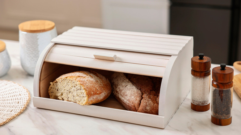 bread box with crusty loaves