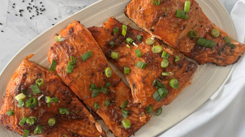 Glazed salmon filets on platter