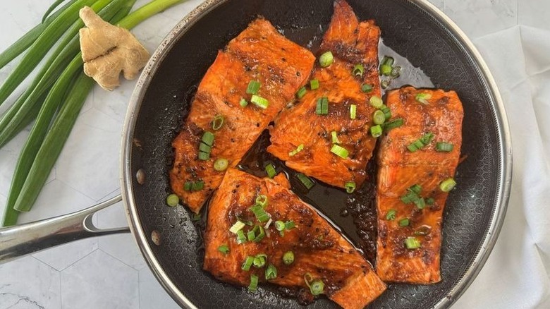Glazed salmon filets in pan