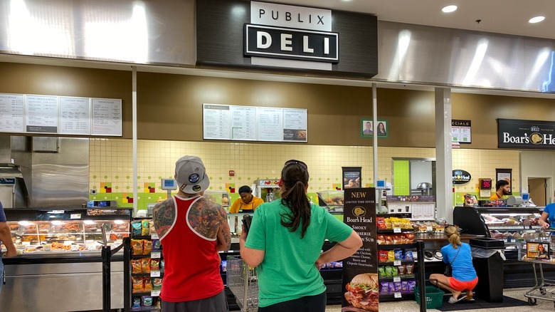 customers queue up for subs at the publix deli