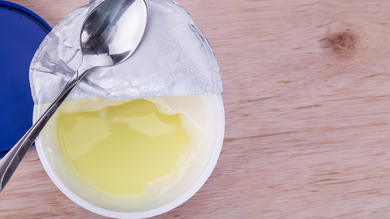 Layer of whey on yogurt