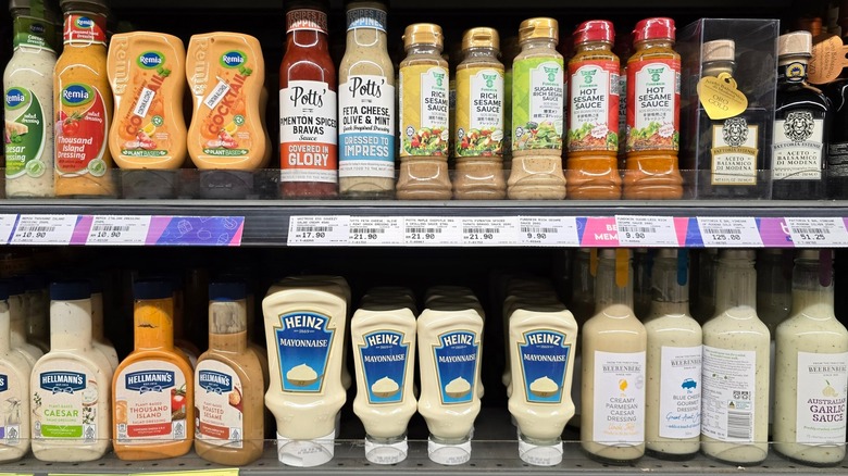 Various sauces on grocery store shelf