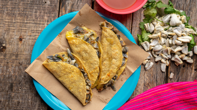 Three huitlacoche tacos on plate
