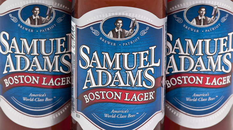 Closeup of Samuel Adams Boston Lager label on three bottles.