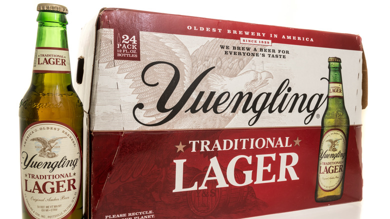 Yuengling Traditional lager glass bottle and cardboard box