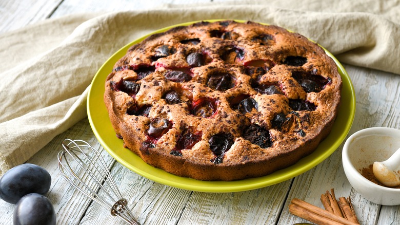 Plum torte on green plate
