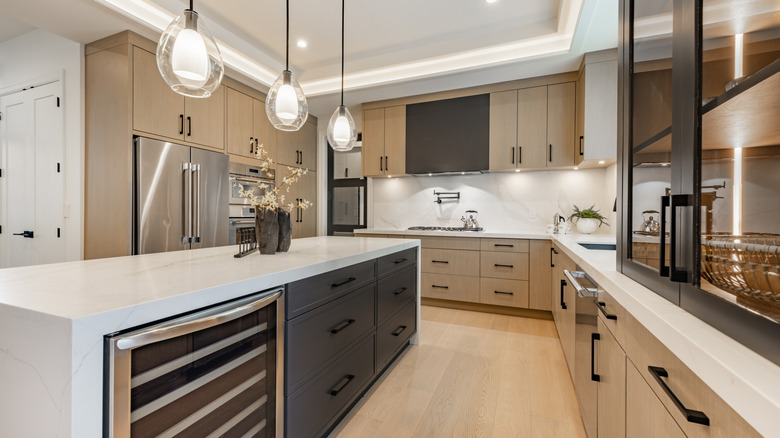 Kitchen with a black, white, and brown color scheme