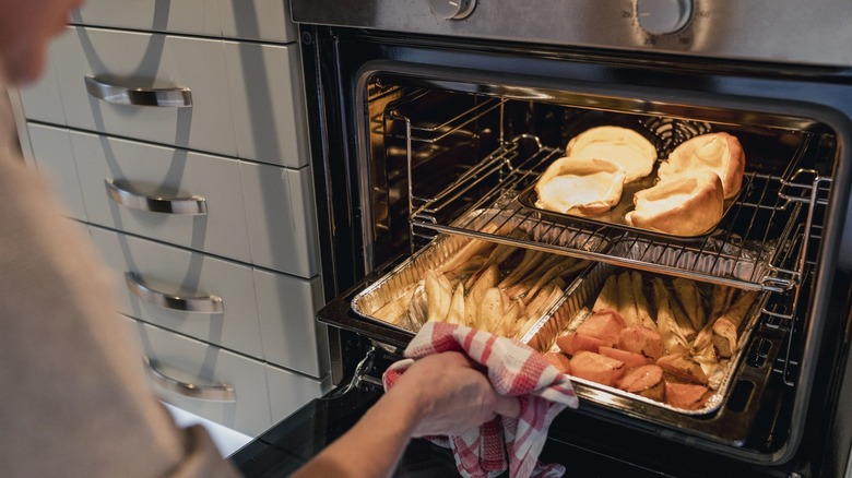 a home chef cooks multiple items in an oven