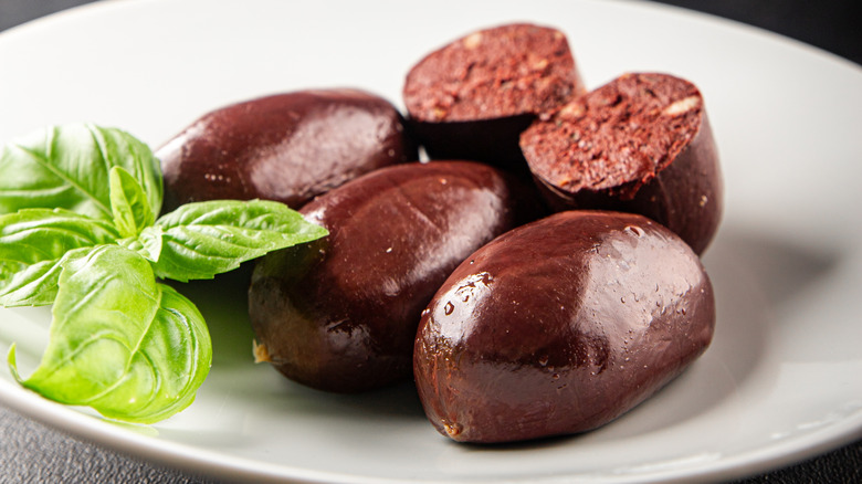 Black pudding sausage on a white plate