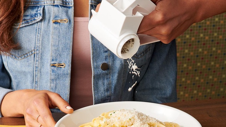 Olive Garden cheese grater in use