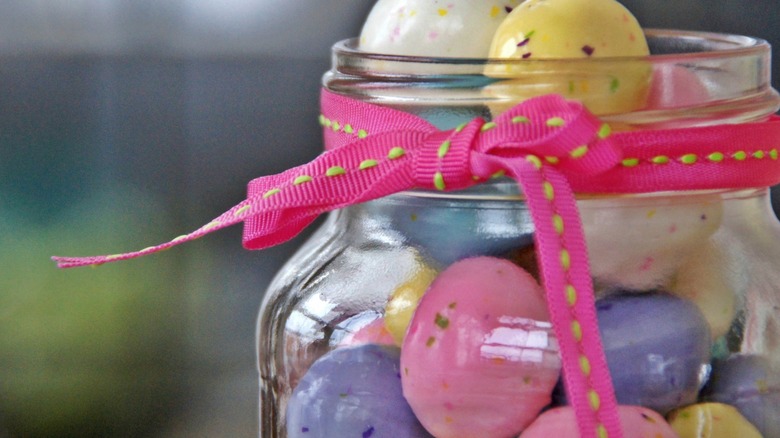 mason jar with grosgrain ribbon and candy eggs