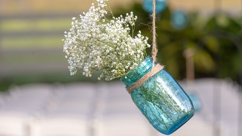 hanging mason jar with twine and baby's breath