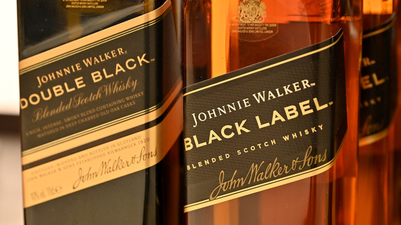 Close-up of Johnnie Walker Black and Double Black bottles