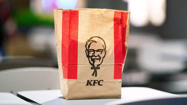 KFC paper bag on restaurant table