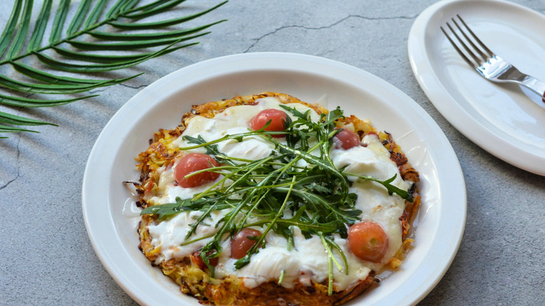 cabbage pizza with mozz, tomato, and herbs