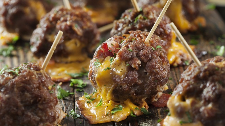 cheese stuffed meatballs on toothpicks