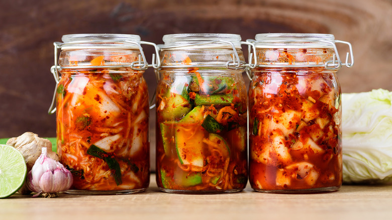 Different kinds of kimchi in sealed jars