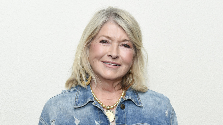Martha Stewart smiling, wearing denim jacket