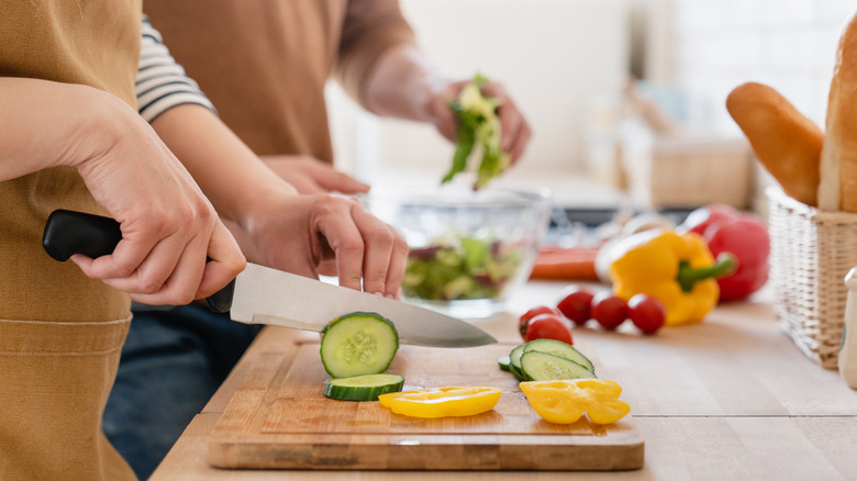 chopping vegetables for pasta salad