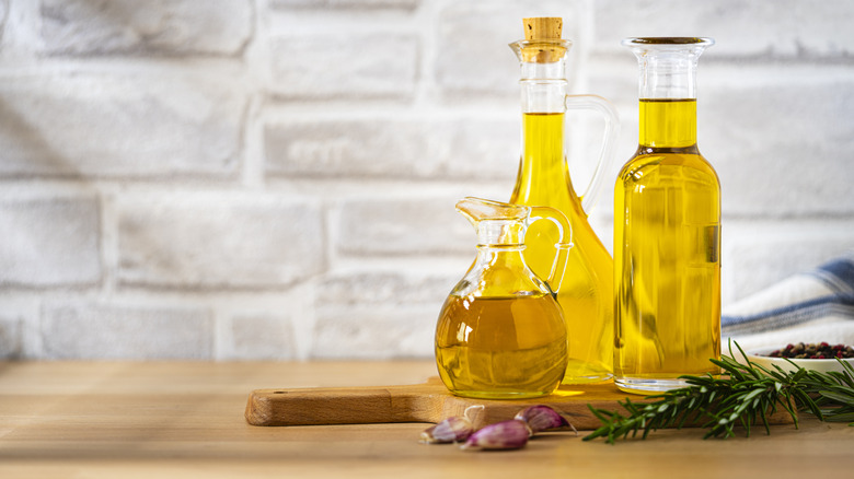 Bottles of olive oil on a counter