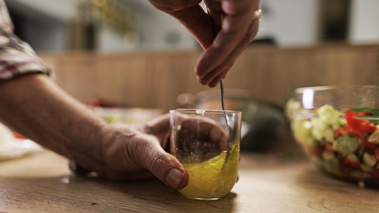 mixing salad dressing
