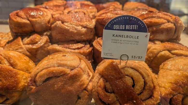 norwegian cinnamon rolls on display with sign