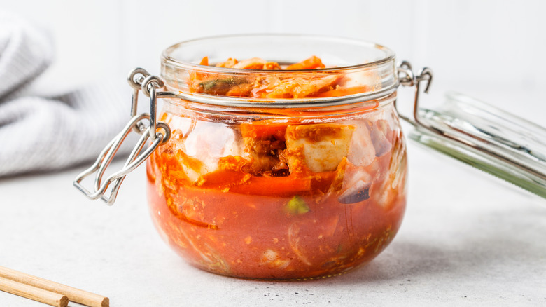 An open jar of kimchi