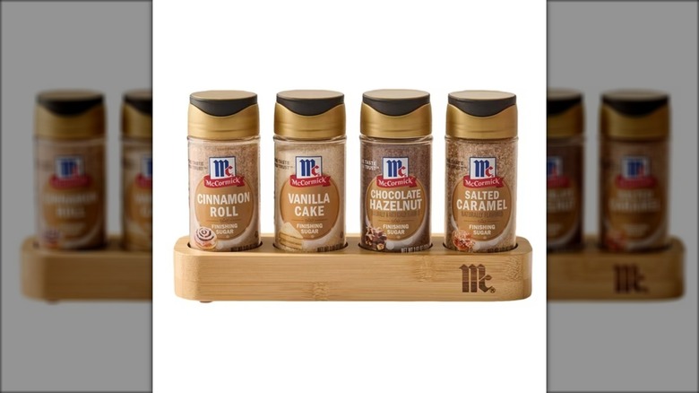 wooden rack of flavored finishing sugars
