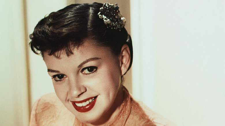 Judy Garland smiling, studio shot.