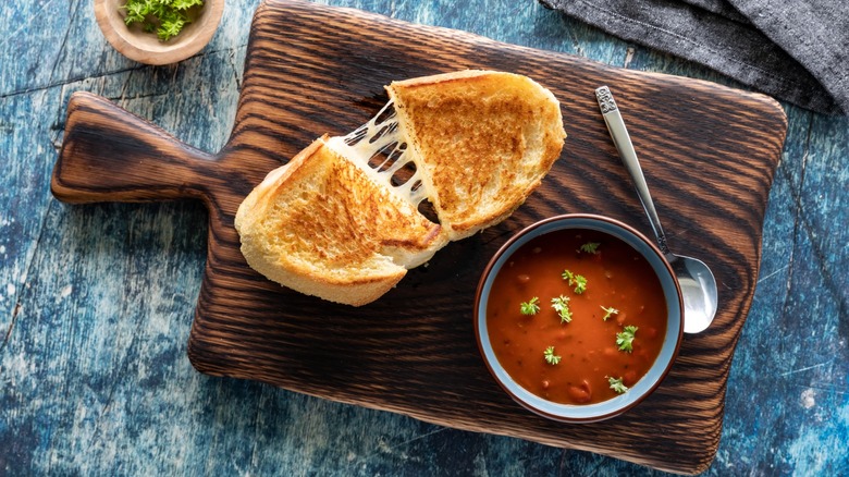 grilled cheese and tomato soup on sandwich board