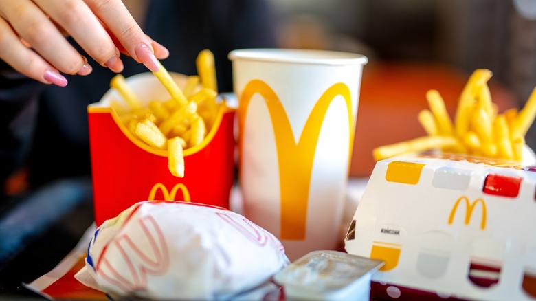 hand drips into a mcdonald's meal