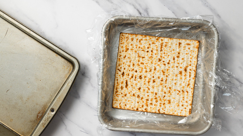 Dipping matzos in water