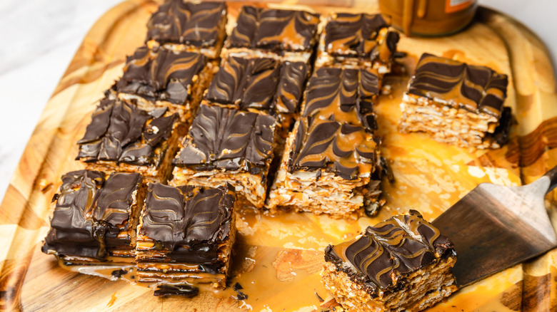 One slice of 3-ingredient passover matzo cake taken out from the rest of the cake