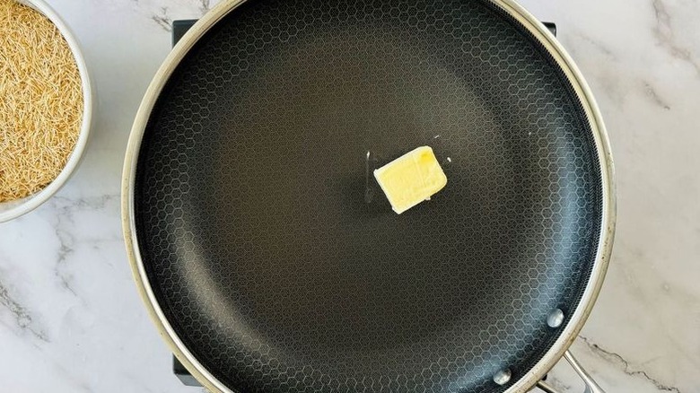 Pat of butter in pan