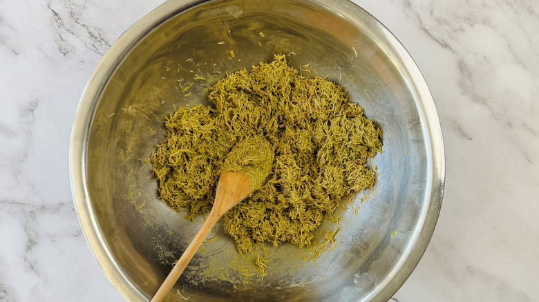 Kataifi and pistachio cream mixture in bowl