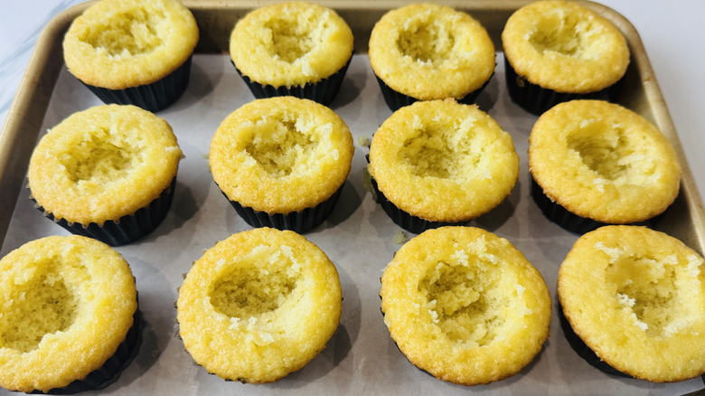 yellow cupcakes with holes in the middle