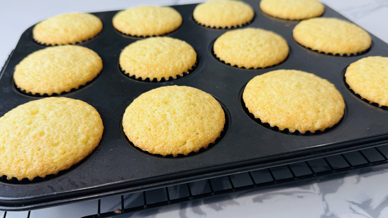 yellow cupcakes in a muffin pan
